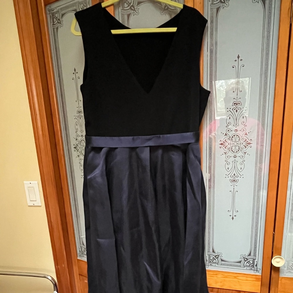 Hutch woman’s cocktail dress. Asymmetrical skirt V open back. Satin bottom